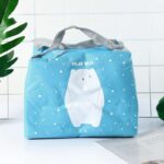 Trousse de toilette pour bebe isolante et isotherme pour les soins dessin représentant un ours polaire blanc