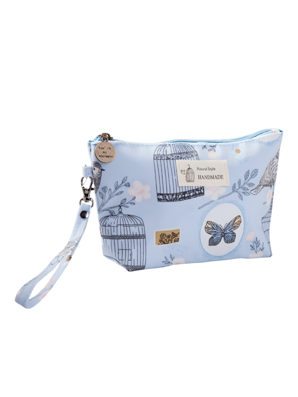 Petite trousse de maquillage florale printanière motif jardin printanier bleu ciel