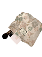 Borsa da toilette in broccato rosa con motivo floreale Borsa da toilette in broccato rosa con motivo floreale