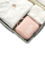 Petite trousse de toilette voyage minimaliste, avec crochet à suspendre, compartiments, coloris homme ou femmes. Pliée dans une valise