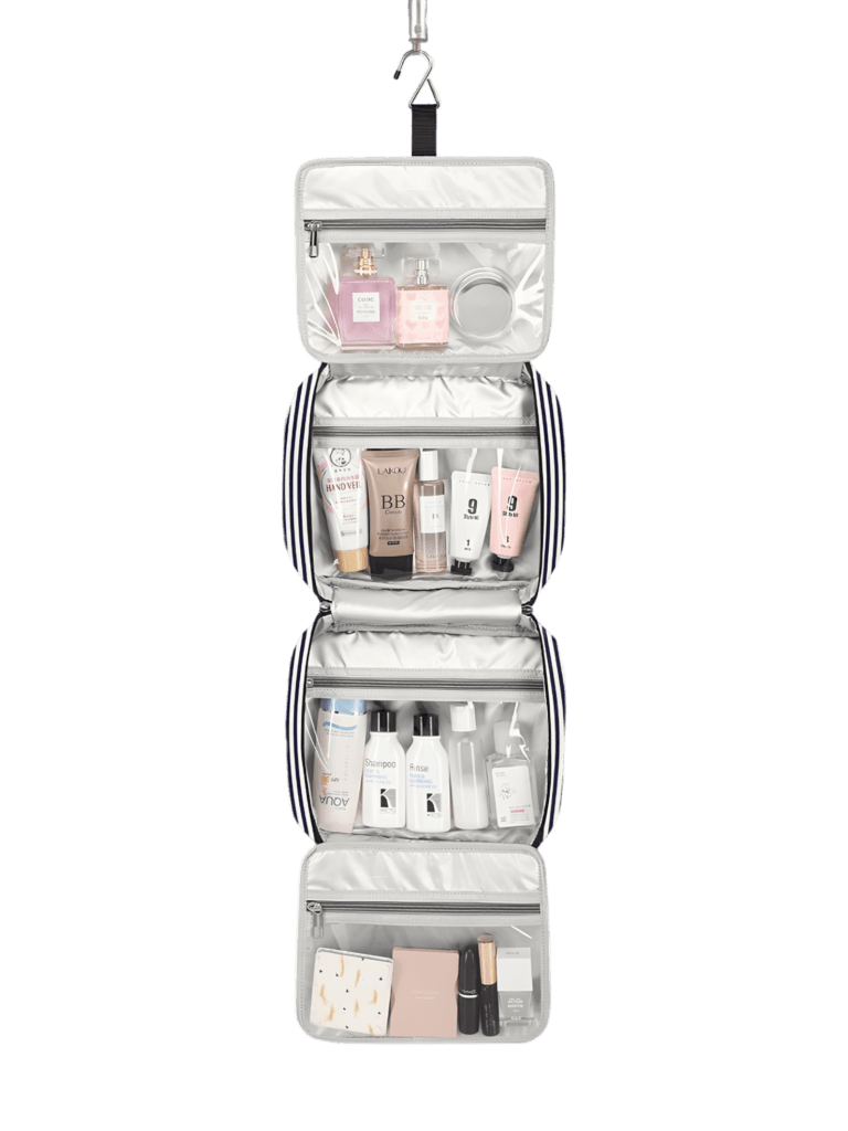 Grande trousse de toilette femme avec compartiments à suspendre, voyage, motif rayures, bandes. Dépliée modèle bleu
