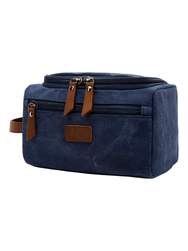 Trousse de toilette homme en toile avec empiècements cuirs et pochette extérieure couleur unie modèle bleu
