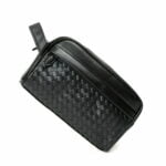 Trousse de toilette noire tressée simple vue transversale Trousse de toilette noire tressée simple vue transversale