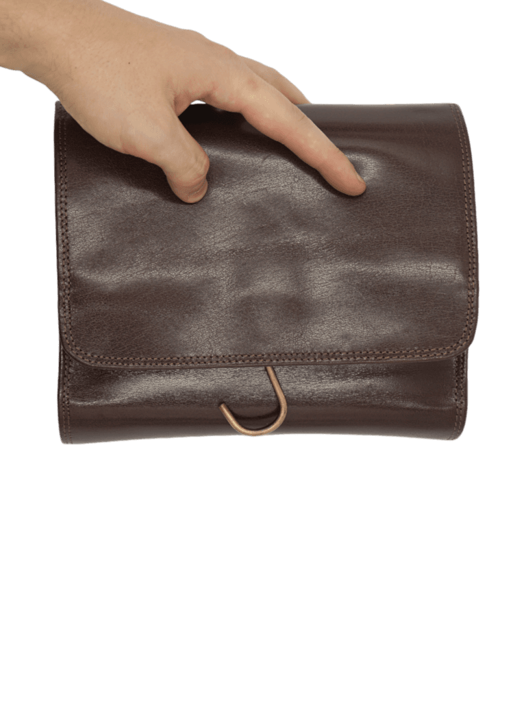Trousse de toilette en cuir à suspendre voyage avec compartiments et bandes élastiques garde accessoire repliée 2
