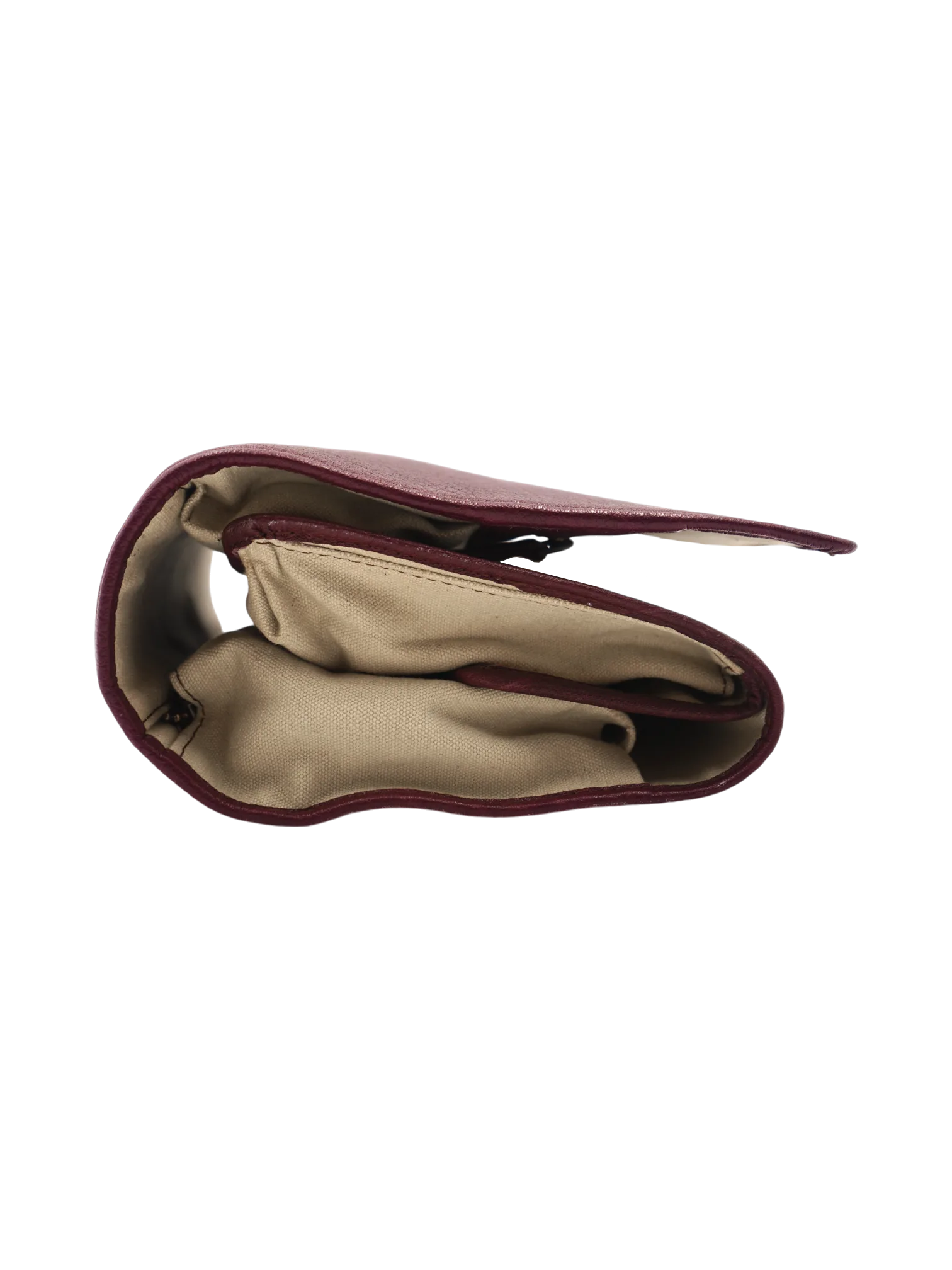 Trousse de toilette femme à suspendre en cuir rouge repliée
