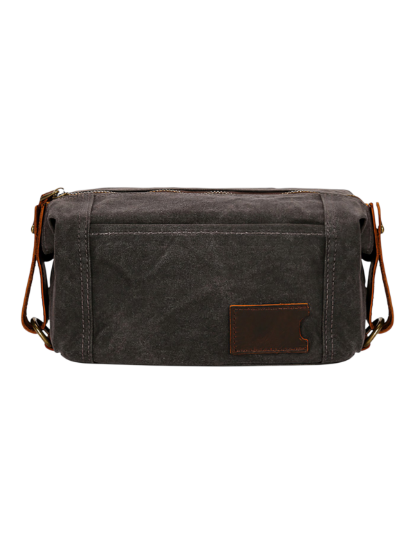 Trousse de toilette homme tissu empiècement cuir avec compartiments style brut en couleur noire organisation efficace des objets personnels