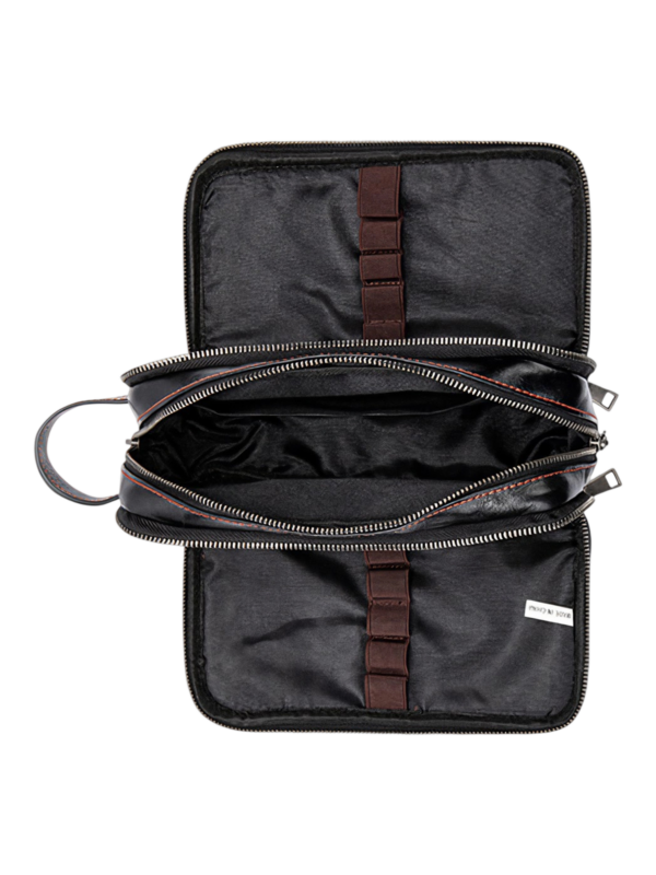 Trousse de toilette triple compartiment en cuir noir et rouge avec pochettes et elastiques pour voyage organisation pratique
